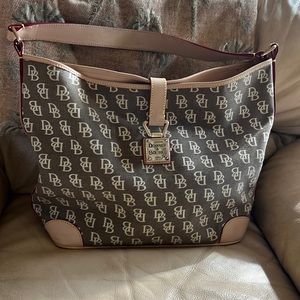 DOONEY & BOURKE Vintage monogram hobo bag. Leather handle & trim. Metal latch.